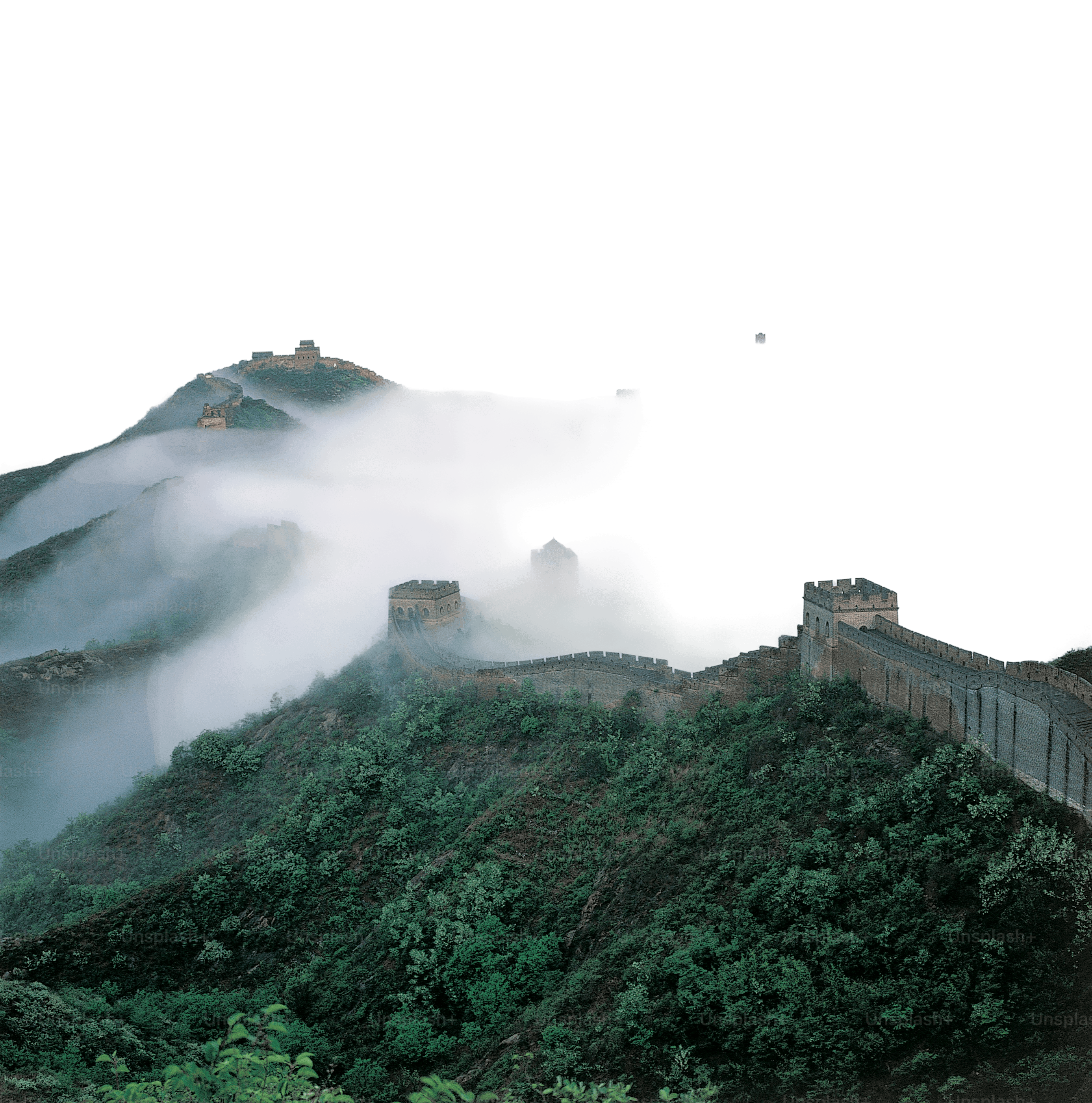 The Great Wall emerging through mountain mist